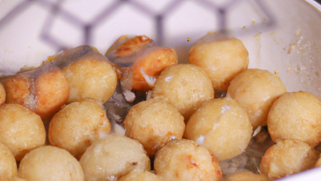 Bolinhos crocantes de dadinho de tapioca assados na Airfryer, com um exterior dourado e um interior macio e mastigável.
