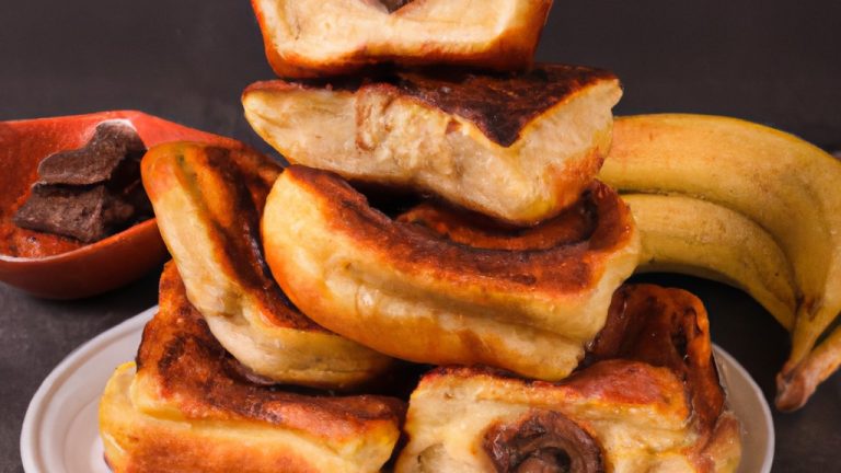 Imagem de uma airfryer com uma fatia de pão de forma torrada, coberta com uma camada de Nutella e fatias de banana. O pão está dourado e crocante, enquanto a Nutella e a banana estão derretidas e borbulhantes.