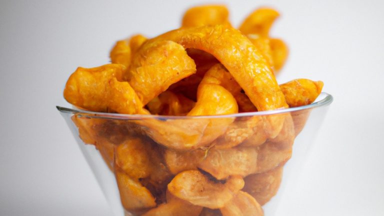 Imagem de um petisco crocante dourado preparado na Airfryer. O petisco é feito de ingredientes simples e é perfeito para um lanche rápido e saboroso.