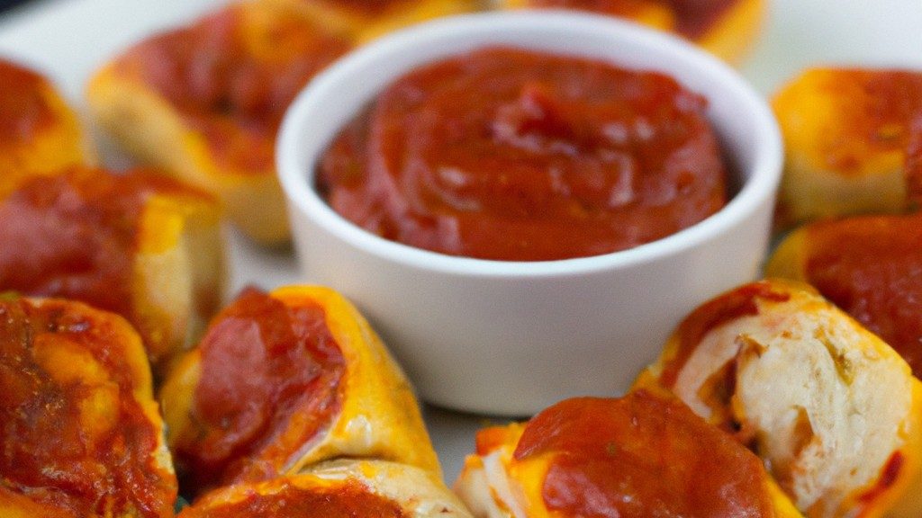 Pizza Bites crocantes e douradas feitas na Airfryer, com massa macia e recheio de queijo derretido. A cobertura é composta por pepperoni, pimentões coloridos e cebolas, criando uma explosão de sabores.