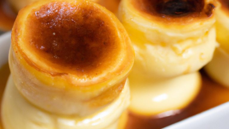 Imagem de um pudim cremoso e dourado em uma tigela, feito na airfryer, com uma colher ao lado, pronto para ser saboreado.