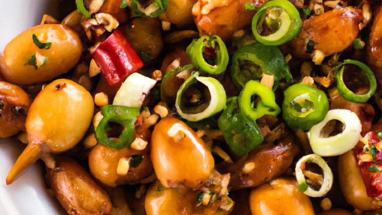 Imagem mostra uma salada de pimentão assado com feijão-branco preparada na Airfryer. A salada é servida em uma tigela e contém pimentões vermelhos e verdes assados, feijão-branco, cebola roxa, azeite, suco de limão e temperos. A salada é colorida, fresca e saudável.