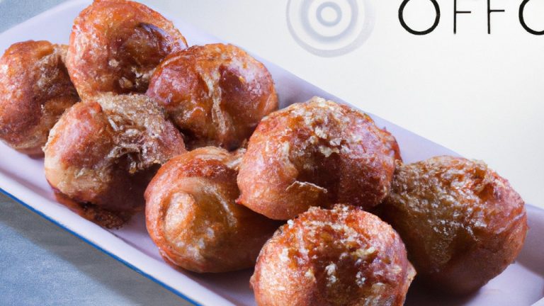 Imagem de takoyaki dourados e crocantes cozidos em uma Airfryer, com tentáculos de polvo visíveis.