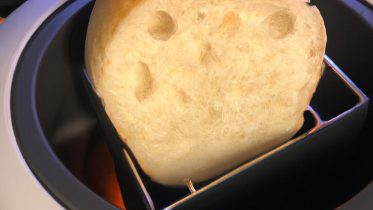 Imagem de torradas de alho crocantes feitas com pão de forma e azeite de oliva, preparadas na airfryer. Elas estão dispostas em um prato, com ervas frescas polvilhadas por cima.