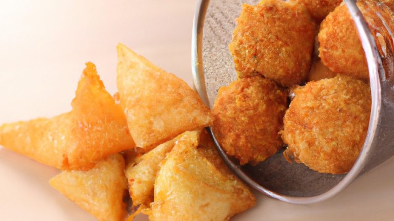 Imagem de um livro de receitas com capa vermelha e branca, com o título "Air Fryer Eos Receitas" impresso na frente. O livro está apoiado sobre uma superfície branca, com uma frigideira a ar preta ao lado.