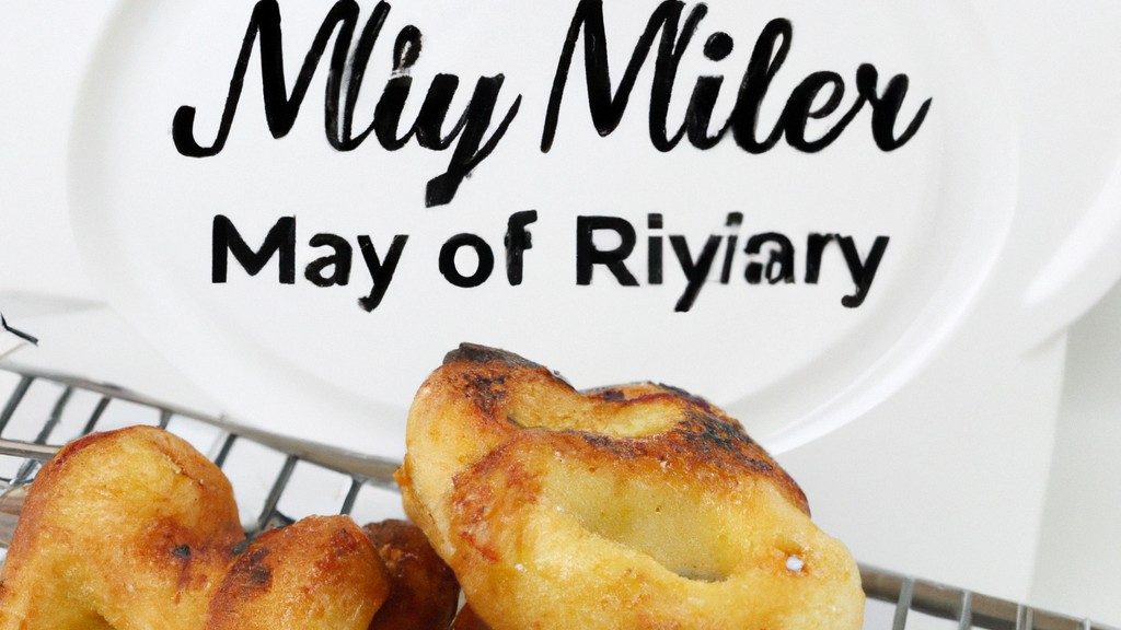 Imagem de uma Air Fryer vermelha com o rosto do Mickey Mouse estampado na frente. A Air Fryer tem orelhas e um nariz do Mickey, além de um sorriso largo.
