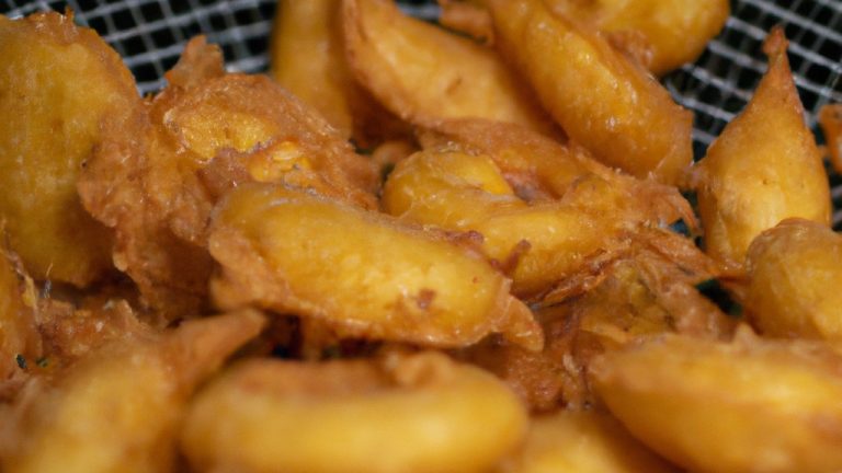 Imagem de Calabresa Defumada Frita Na Airfryer: Fatias crocantes e douradas de calabresa defumada, fritas com perfeição na Airfryer. A superfície crocante contrasta com o interior suculento e saboroso, criando um petisco irresistível.