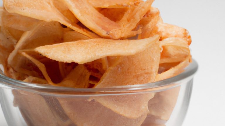 Imagem de Chips De Parma / Presunto Cru Na Airfryer: Fitas finas e crocantes de presunto de Parma secas ao ar, preparadas na Airfryer para um lanche rápido e delicioso.