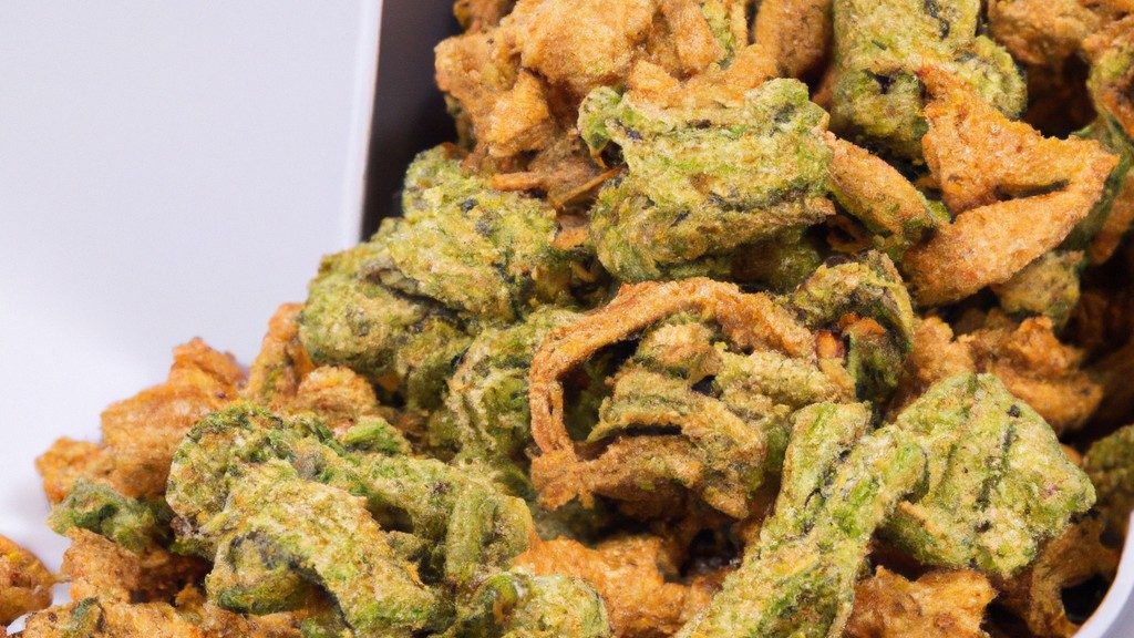 Imagem de couve crocante e couve refogada preparadas em uma Airfryer. A couve crocante tem uma cor verde vibrante, com bordas douradas e crocantes. A couve refogada tem uma cor verde mais escura, com folhas macias e tenras. Ambas as preparações estão em uma cesta da Airfryer, com um fundo preto.
