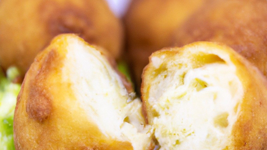 Uma Couve-Flor Recheada crocante e dourada, cozida perfeitamente na Airfryer. A couve-flor é recheada com uma mistura saborosa de legumes, arroz e especiarias, criando um prato saudável e satisfatório. A cobertura crocante de queijo derretido adiciona um toque extra de crocância e sabor.