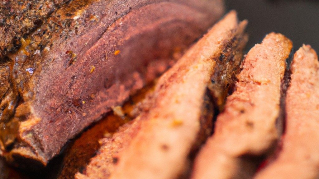 Picanha inteira perfeitamente assada na Airfryer, exibindo sua crosta dourada e suculenta. A carne é tenra e saborosa, com uma camada externa crocante e um interior suculento e macio. O corte generoso de picanha é apresentado em uma travessa, pronto para ser saboreado como uma refeição farta e satisfatória.