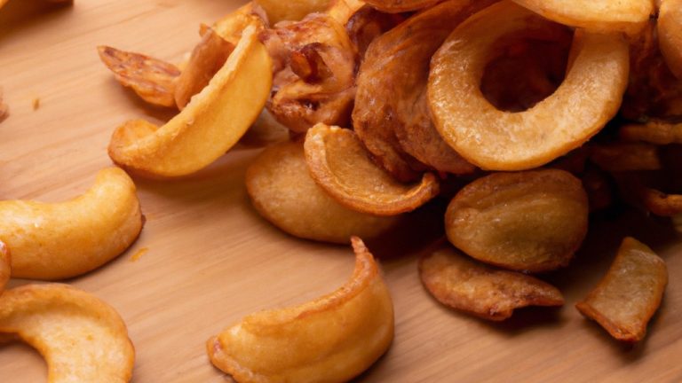 Imagem de batatas fritas crocantes e douradas preparadas em uma Airfryer, perfeitas para um lanche rápido ou acompanhamento.